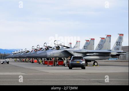 U.S. Airmen assigned to the 67th Fighter Squadron and 67th Aircraft Maintenance Unit conduct pre-flight operations during RED FLAG-Alaska 22-1 on Eielson Air Force Base, Alaska, May 2, 2022. RF-A 22-1 provides training for deployed maintenance and support personnel in sustainment of large-force deployed air operations. (U.S. Air Force photo by Senior Airman Jose Miguel T. Tamondong) Stock Photo