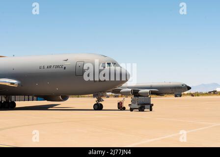 A KC-46 Pegasus and KC-135 Stratotanker from Altus Air Force Base, Oklahoma, are parked on the flightline, May 5, 2022, on Holloman Air Force Base, New Mexico. Both aircraft are static displays for the 2022 Legacy of Liberty Air Show and Open House and represent the legacy and future generations of aerial refuelers. (U.S. Air Force photo by Airman 1st Class Nicholas Paczkowski) Stock Photo