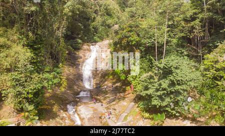Waterfall in cameron highlands, malaysia. The water tumbles down the rocks into a small river. Refreshment for trekkers through the jungles of Malaysi Stock Photo