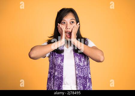 woman feeling shocked and suprised over isolated background Stock Photo ...