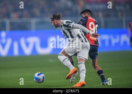 Genoa, Italy. 30 April 2022. Antonio Candreva of UC Sampdoria competes for  the ball with Pablo Galdames of Genoa CFC during the Serie A football match  between UC Sampdoria and Genoa CFC.