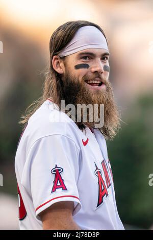 Los Angeles Angels center fielder Reggie Willits lies on the ground as ...