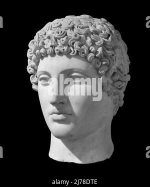 Ancient statue of the antique god of commerce, merchants and travelers Hermes - Mercury. Head sculpture isolated on black background with clipping Stock Photo