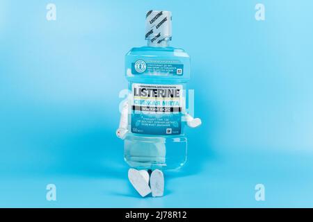 Tyumen, Russia-February 06, 2022: Listerine Cool Mint Mouthwash are clinically shown. Blue background copy space Stock Photo