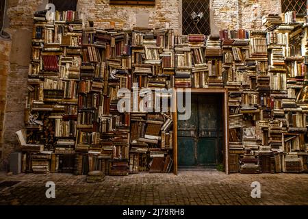 A wall of books in Pesaro Stock Photo