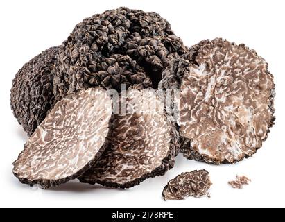 Black winter truffles on white background. The most famous of the truffles. Stock Photo