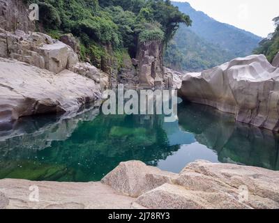 river water with naturally formed white shiny stone in unique shape at dry river bed at morning image is taken at Sliang wah Umngot amkoi jaintia hill Stock Photo