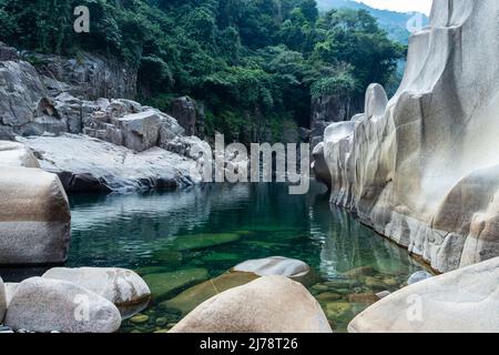 river water with naturally formed white shiny stone in unique shape at dry river bed at morning image is taken at Sliang wah Umngot amkoi jaintia hill Stock Photo