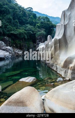 river water with naturally formed white shiny stone in unique shape at dry river bed at morning image is taken at Sliang wah Umngot amkoi jaintia hill Stock Photo