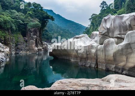 river water with naturally formed white shiny stone in unique shape at dry river bed at morning image is taken at Sliang wah Umngot amkoi jaintia hill Stock Photo