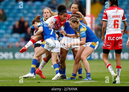 Chantelle Crowl of St Helens is tackled by Alex Stimpson of York RLFC ...