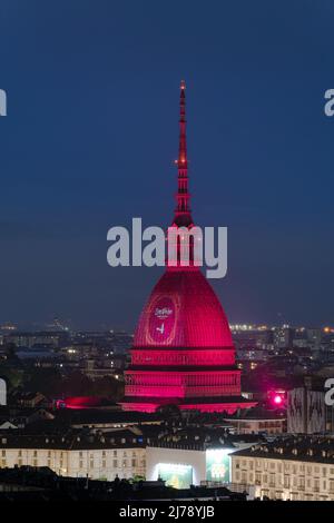 Eurovision Song Contest logo projected on the Mole Antonelliana. The 66th edition will be held in Turin. Turin, Italy - May 2022 Stock Photo