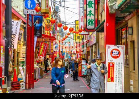 Yokohama, Japan - April 21, 2017: chinese people in Yokohama Chinatown, the Japan's largest Chinatown. Urban pedestrian street walking area Stock Photo