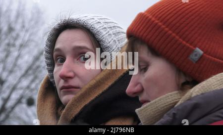 KYIV, UKRAINE - MARCH 9: Evacuees from Irpin and Vorzel at an emergency camp set up for evacuated residents from active combat areas on the outskirts of Kyiv, as Russia's invasion of Ukraine continues on 9 March 2022 in Kyiv, Ukraine. Russia began a military invasion of Ukraine after Russia's parliament approved treaties with two breakaway regions in eastern Ukraine. It is the largest military conflict in Europe since World War II. Stock Photo