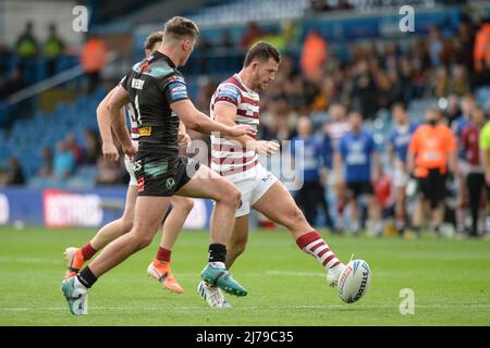 Leeds, England - 7th May 2022 - Cade Cust of Wigan Warriors kicks through. Rugby League Betfred Challenge Cup Semi Finals Wigan Warriors vs St. Helens at Elland Road Stadium, Leeds, UK  Dean Williams Credit: Dean Williams/Alamy Live News Stock Photo