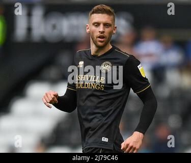 Queens Park Rangers' Sam Field (centre) celebrates with team-mates ...