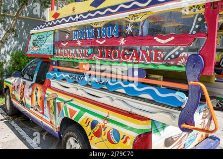 Miami Florida Little Haiti Haitian Creole culture covered pickup truck taxi tap tap camionette colorfully brightly painted Stock Photo