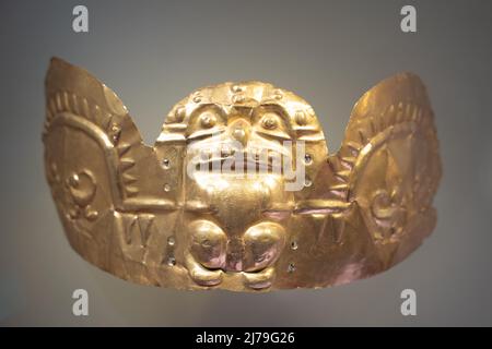 Bogota, Colombia, Gold Museum, May 5, 2022. Pre-Columbian artifact in the shape of a figure. Stock Photo