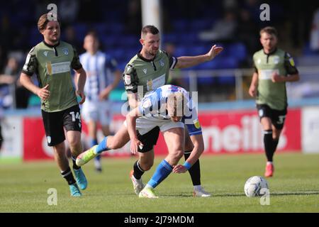 HARTLEPOOL, UK. MAY 7TH Hartlepool United's Marcus Carver battles with Colchester's Tommy Smith during the Sky Bet League 2 match between Hartlepool United and Colchester United at Victoria Park, Hartlepool on Saturday 7th May 2022. (Credit: Mark Fletcher | MI News) Credit: MI News & Sport /Alamy Live News Stock Photo