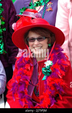 Women of the Red Hat Society celebrate on St. Patrick's' day in the USA, face Stock Photo