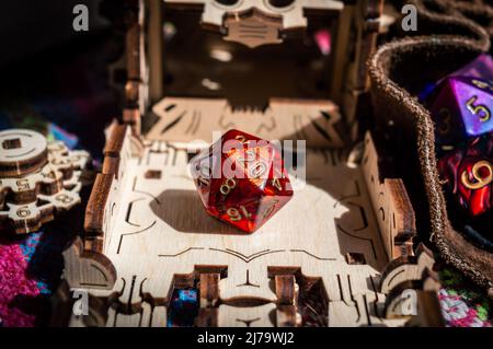 Close-up image of a red role-playing die. Stock Photo