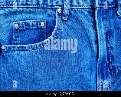 Blue denim Jeans pocket with revits texture background Stock Photo