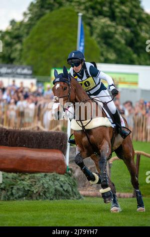 Badminton Horse Trials 2022, Gloucestershire, UK. 7th May 2022. Laura Collett and London 52 representing Great Britain during the Cross Country Phase on Day 3 of the 2022 Badminton Horse Trials presented by MARS at Badminton House near Bristol, Gloucestershire, England, United Kingdom. Jonathan Clarke / Alamy Live News Stock Photo