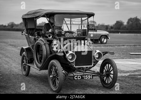 1912 Ford Model T tourer (CD 1591) taking part in the vehicle parade at Shuttleworth Season Premiere airshow held on the 1st May 2022 Stock Photo