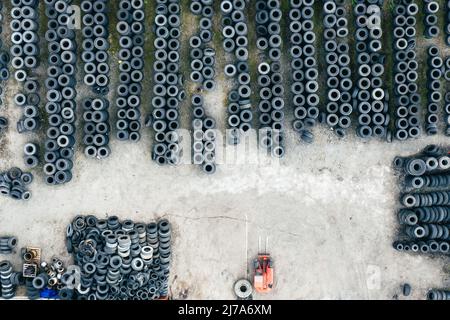 Industrial Tires Storage Place from Above. Aerial View. Stock Photo