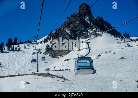 Gondola lift going up at the Snowbasin Ski Resort in Utah. Stock Photo