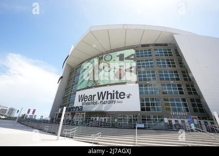The FTX Arena with 'Wear White. White Hot Playoffs 2022' banner and image of Miami Heat guard Tyler Herro (14) is seen, Monday, May 2, 2022, in Miami. Stock Photo