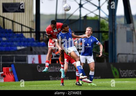 OLDHAM, UK. MAY 7TH Ludwig Francillette of Crawley Town Football Club tussles with Oldham Athletic's Kyle Jameson during the Sky Bet League 2 match between Oldham Athletic and Crawley Town at Boundary Park, Oldham on Saturday 7th May 2022. (Credit: Eddie Garvey | MI News) Credit: MI News & Sport /Alamy Live News Stock Photo