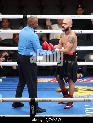 Las Vegas, United States. 07th May, 2022. LAS VEGAS, NV - MAY 7: Boxer Manuel Correa checks with the referee after being knocked down by Elnur Abduraimov in the 2nd round of their fight at the T-Mobile Arena on May 7, 2022 in Las Vegas, Nevada, USA. (Photo by Alejandro Salazar/PxImages) Credit: Px Images/Alamy Live News