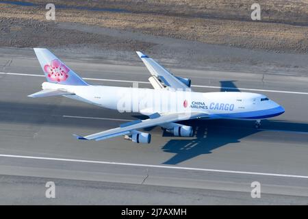 China Airlines Cargo Boeing 747 freighter aircraft landing. Large cargo airplane 747-400F from above. Plane 747F arrival. Stock Photo
