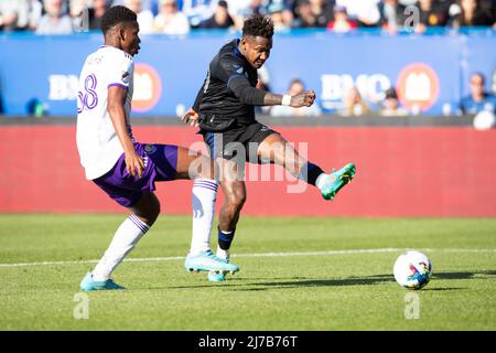 May 07, 2022: CF Montreal Romell Quioto (30) boots the ball while Orlando City Thomas Williams (68) defends during the MLS match between Orlando City and CF Montreal held at Saputo Stadium in Montreal, Quebec. Daniel Lea/CSM Stock Photo