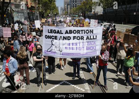 Protesters hold a banner expressing their opinion during the demonstration. SF Defend Roe v. Wade March demanding to uphold the rights of abortion via the protest. The participants think the Supreme Court of the U.S has declared war against women and all those who seek to have an abortion. Stock Photo