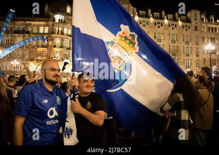 Fans of Futebol Clube do Porto celebrate the victory of the 30th national champion title at Avenida dos Aliados in Porto. Stock Photo