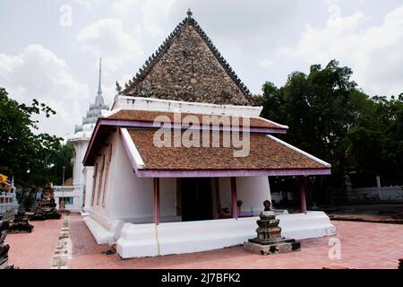 Ancient old ordination hall or antique ubosot church and ruins stupa chedi for thai people visit respect praying blessing holy worship at Wat Chomphuw Stock Photo