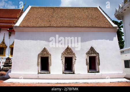 Ancient old ordination hall or antique ubosot church and ruins stupa chedi for thai people visit respect praying blessing holy worship at Wat Chomphuw Stock Photo