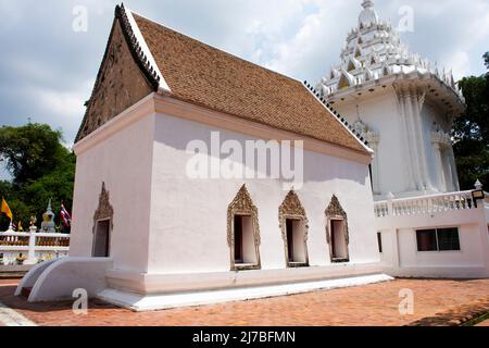 Ancient old ordination hall or antique ubosot church and ruins stupa chedi for thai people visit respect praying blessing holy worship at Wat Chomphuw Stock Photo