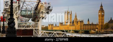 LONDON, UK - MAY 03, 2008:  Panorama of London Eye with Houses of Parliament and Big Ben in the Background Stock Photo