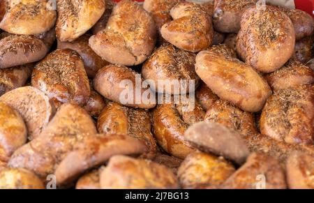 Home-baked Beef Latvia on a white plate on a white wooden table, top view. Flat lay, overhead, from above Stock Photo