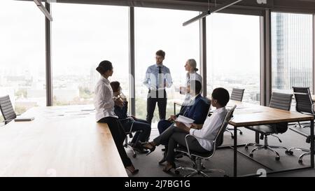 Diverse business group brainstorming in modern office open space Stock Photo