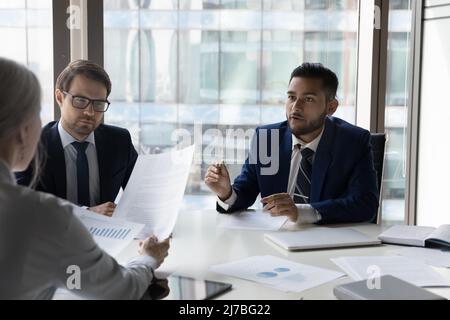 Job candidate and employer discussing work experience Stock Photo