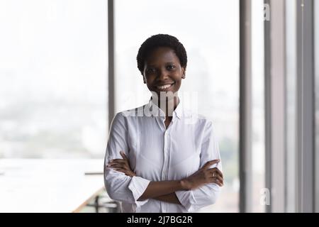 Confident happy African American company owner, business leader Stock Photo