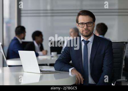 Confident serious business leader man in glasses corporate portrait Stock Photo