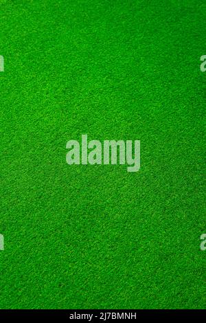 Artificial grass texture from above filling the entire frame Stock Photo