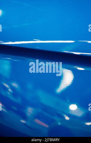 Metallic bended blue surface with reflections Stock Photo