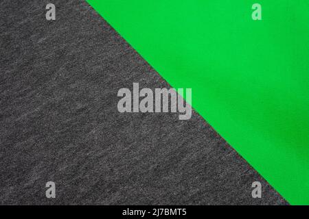 Union between a grey and a green carpet from above Stock Photo