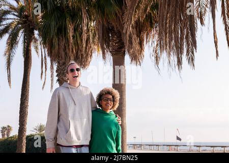 young couple having good time while taking a walk Stock Photo